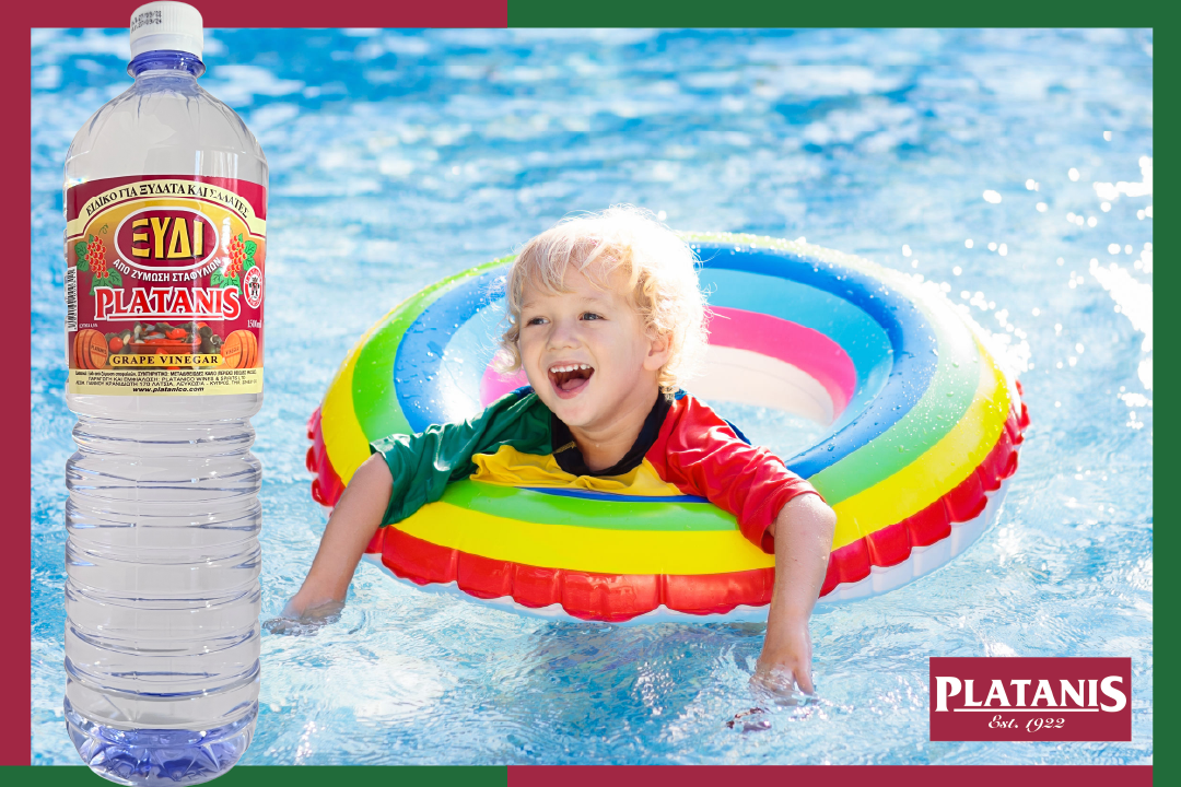 A happy child with a swimming float in the pool that has been disinfected by Platanis white vinegar