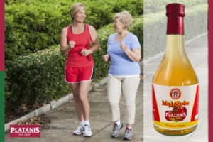 A younger and an older woman walking and enjoying the health benefits of Platanis apple cider vinegar